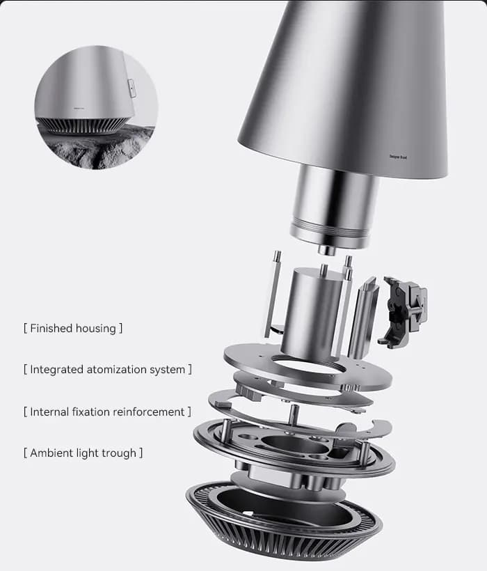 Exploded ScentStudio construction showing the atomiser and all-metal body